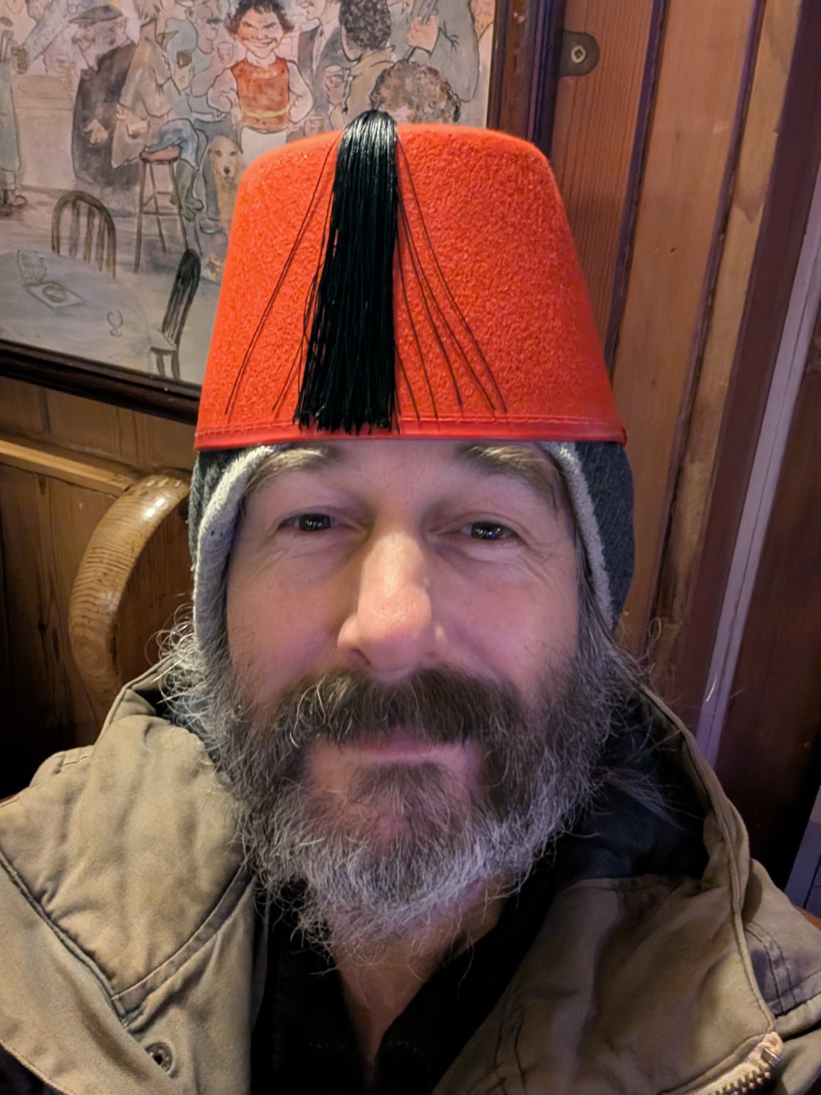 Benjamin wearing a red fez